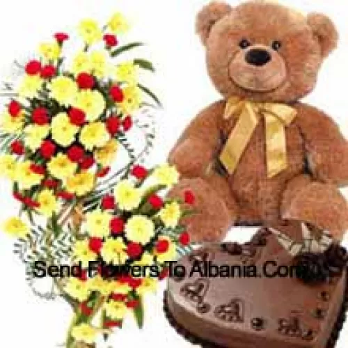 Un arrangement de 3 pieds de haut de fleurs assorties, un gâteau en forme de cœur de 1 kg et un ours en peluche de 2 pieds de haut