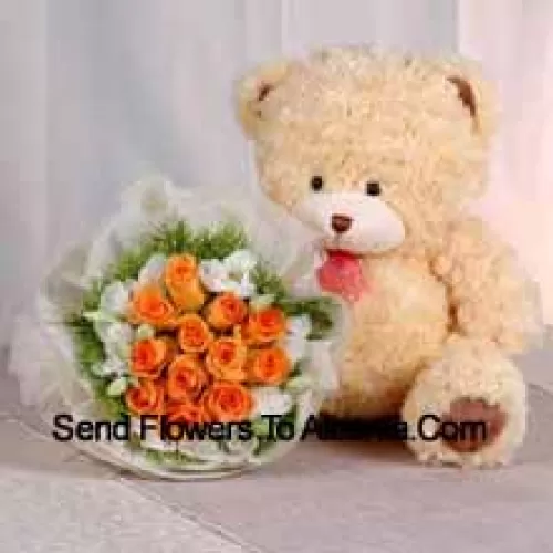 Bouquet de 11 roses orange et un ours en peluche de taille moyenne mignon